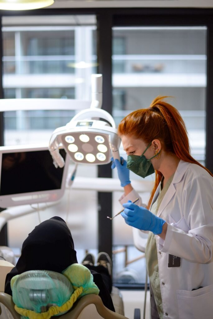 Dentist examining gum health at a dental clinic in Thornhill
